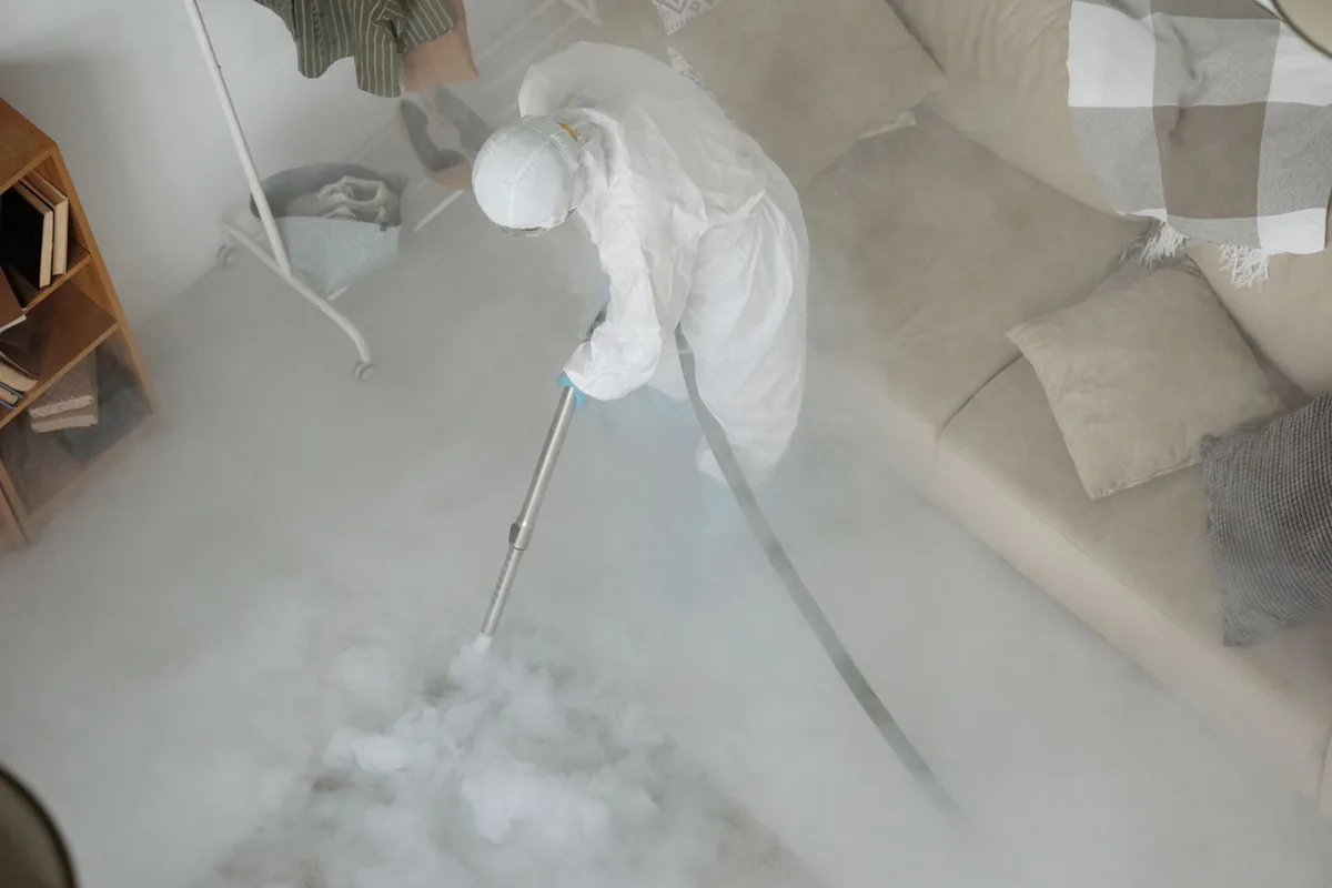 Biohazard cleanup technician in protective equipment, Overlook, Portland, OR